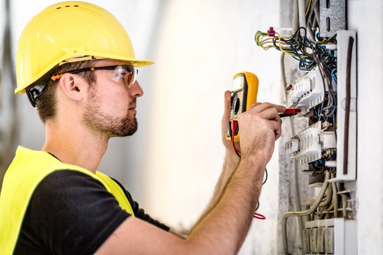 Electrical Contractor or Electrician working on a job site.